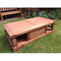 Substantial solid oak coffee table with 2 storage spaces and spacious drawer very good condition