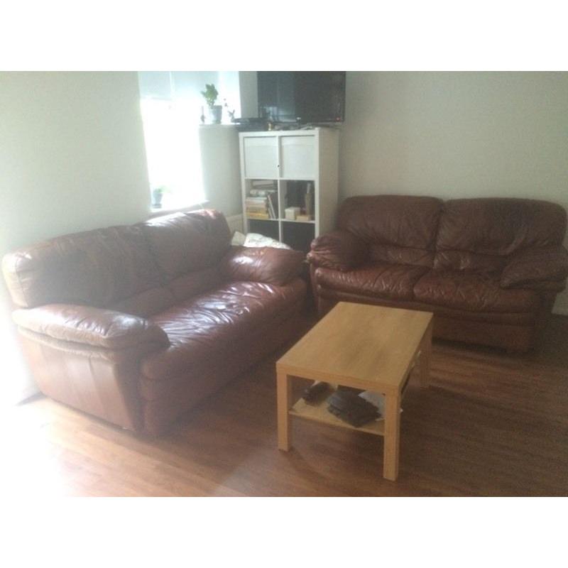 Brown real leather couches