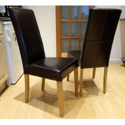 2 leather high back dining chairs