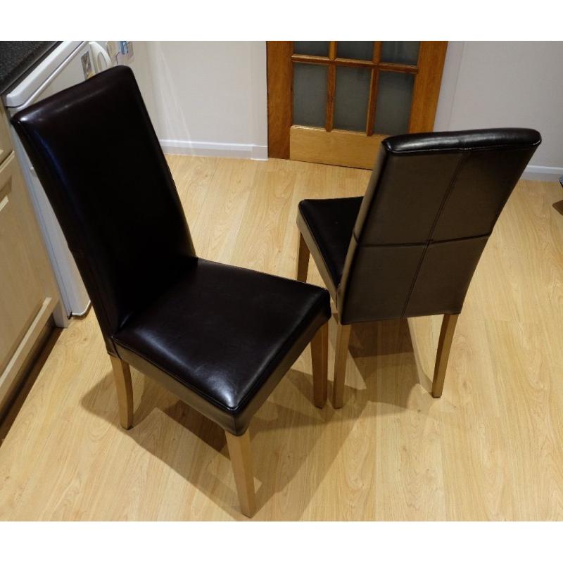 2 leather high back dining chairs