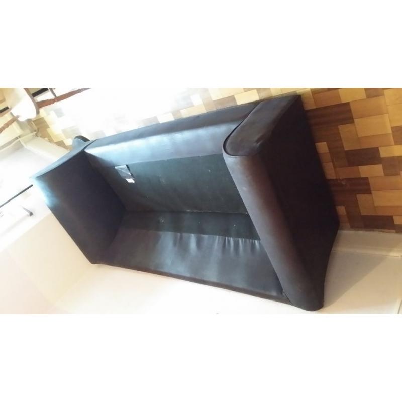 Black suede like 3 seater sofa but NO Cushions.