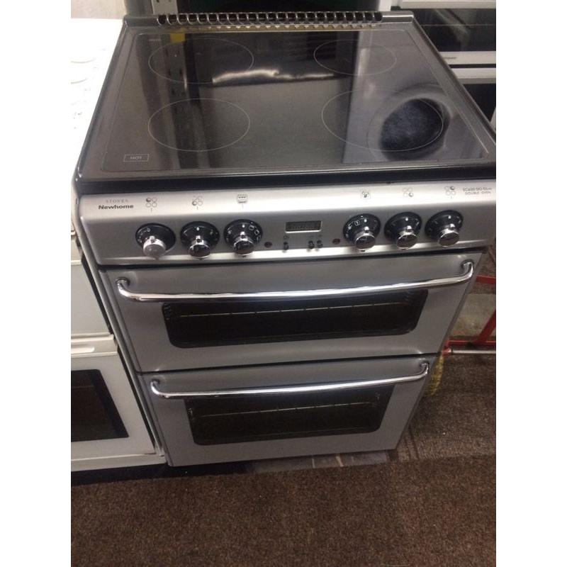 Black & silver new home 60cm ceramic hub electric cooker grill & fan oven good condition with guara