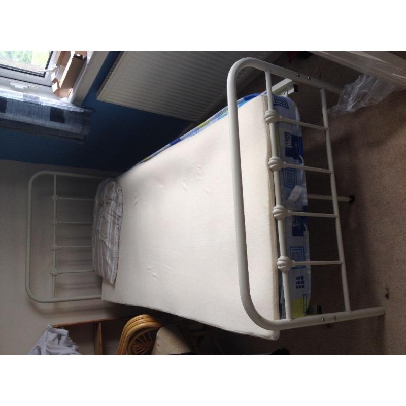 Single bed frame with mattress and mattress topper