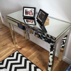 Mirrored glass console table