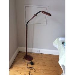 Retro Standard/floor lamp. Tortoiseshell coloured. We think it is made out of Bakelite.