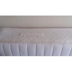 Memory foam top layer twin spring double mattress.