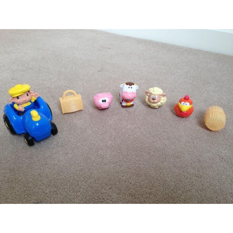 Little people barn with farm animals, hay, farmer and tractor, has buttons/sounds/music