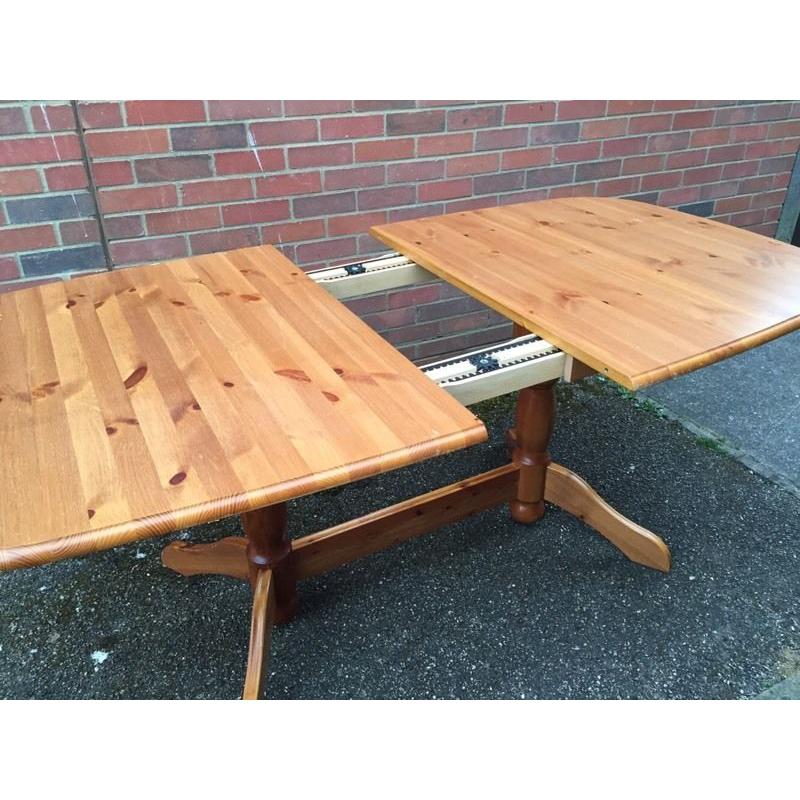 Solid wood dining table and 6 chairs