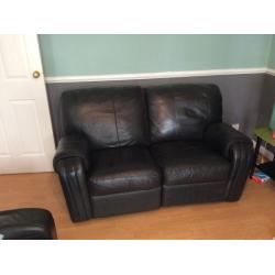 Two seater leather recliner sofa brown