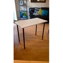 White table with black legs