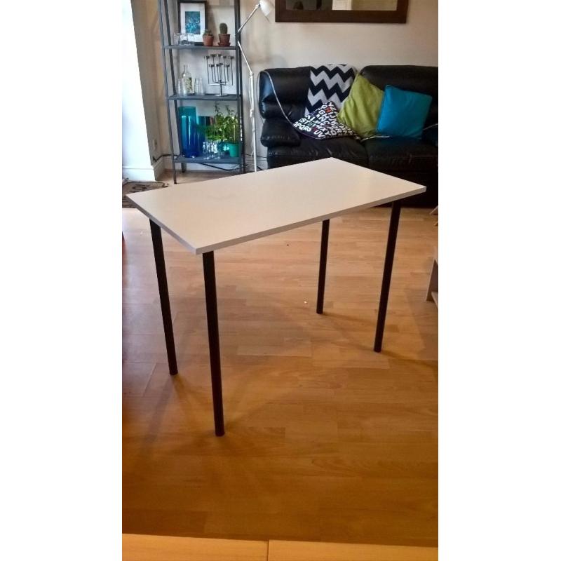 White table with black legs