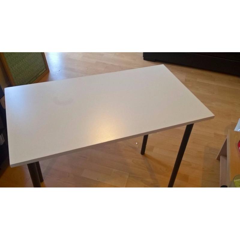 White table with black legs