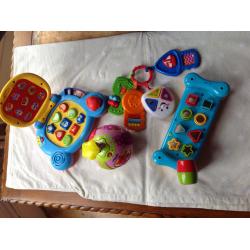 Four interactive and educational toys: Fisher Price, Vitech, Early Learning age 0-36 months