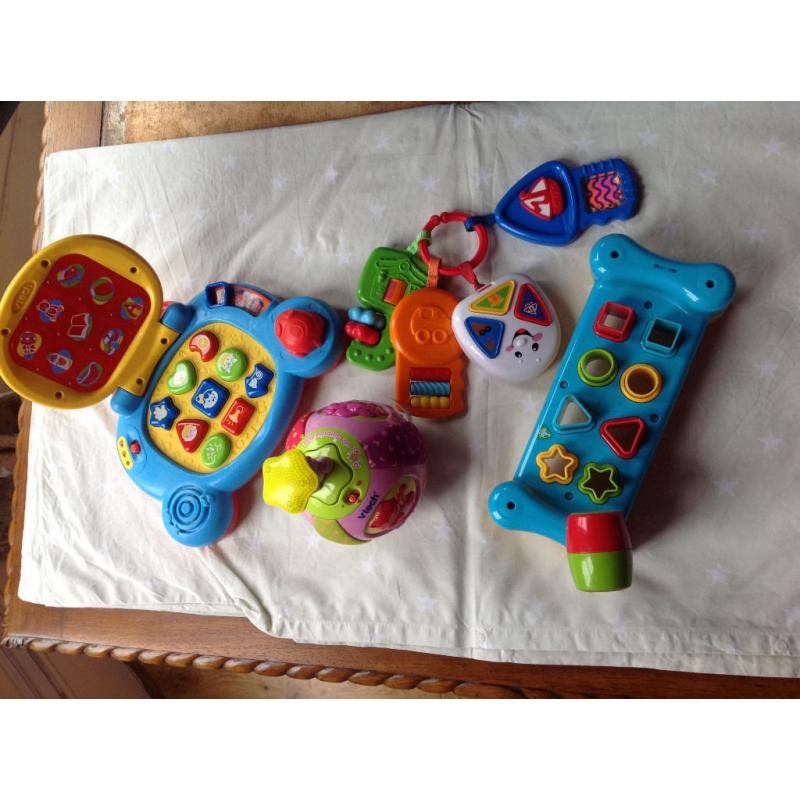 Four interactive and educational toys: Fisher Price, Vitech, Early Learning age 0-36 months