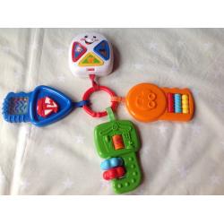 Four interactive and educational toys: Fisher Price, Vitech, Early Learning age 0-36 months