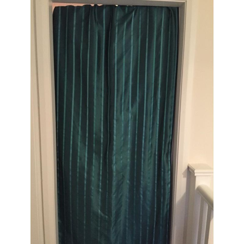 Pair of teal curtains