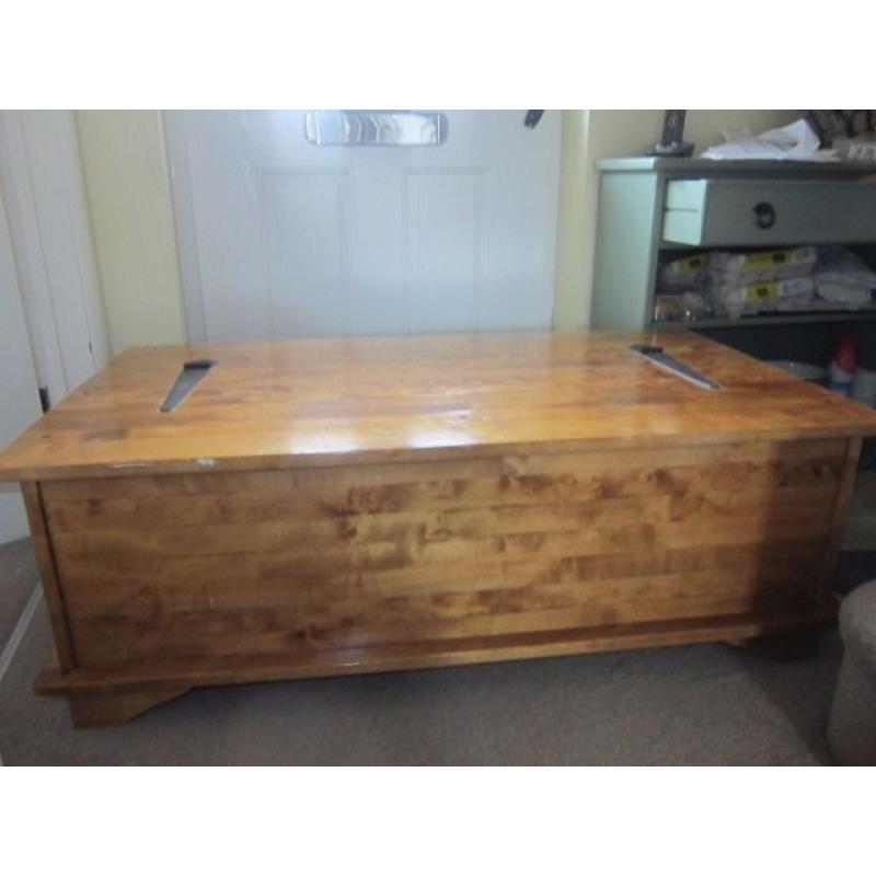 Laura Ashley wooden coffee table with 12 draws and opens for storage