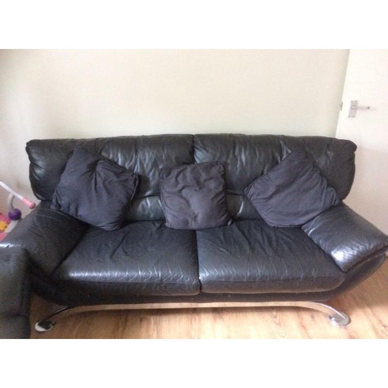 Black faux leather 3 seater and 2 arm chairs