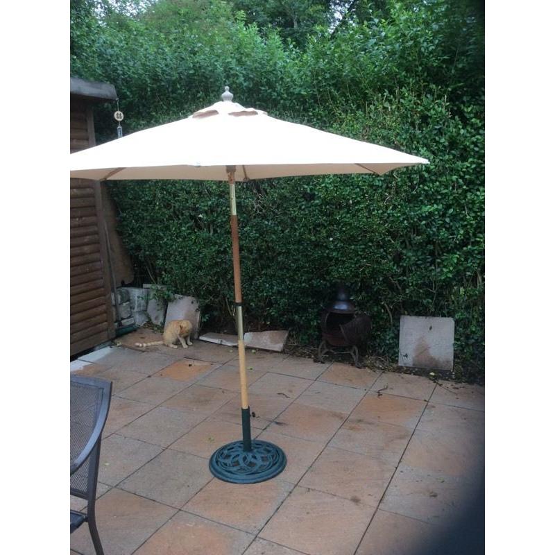 Parasol and cast iron base