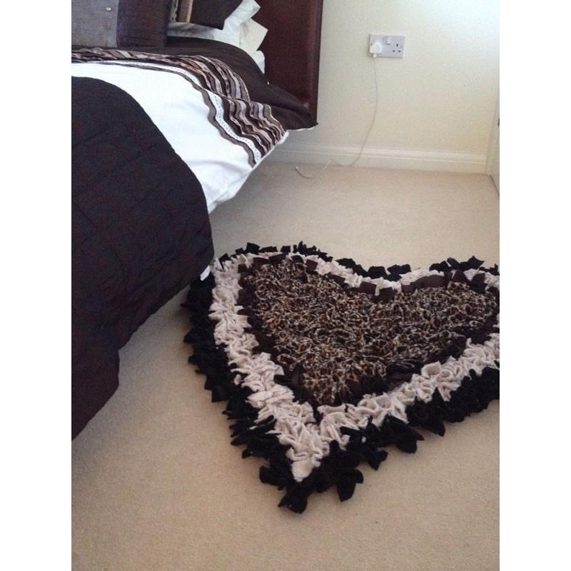 Heart shaped rag rug.