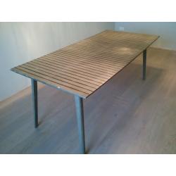 Green slatted dining table