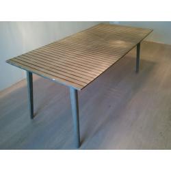 Green slatted dining table