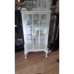 French style queen anne cabinet