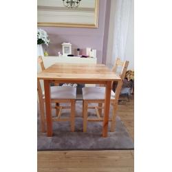 Extending table and 2 chairs