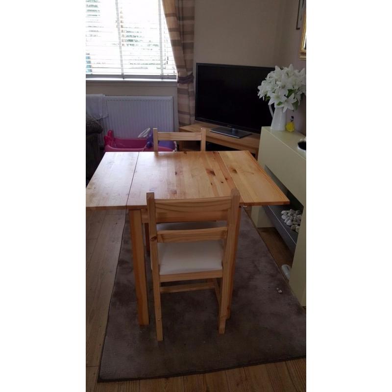 Extending table and 2 chairs