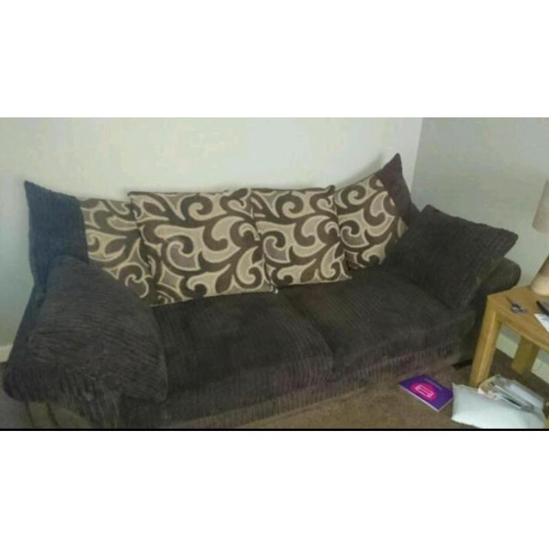 Brown fabric three seater sofa with scatter back cushions