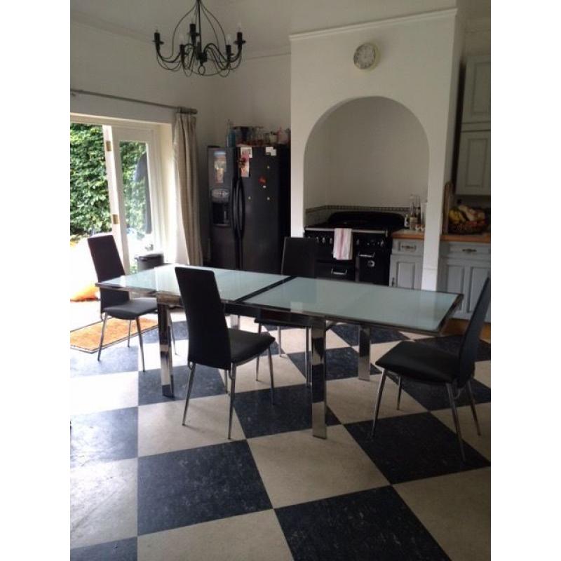 Glass and Metal Table and 6 Grey Chairs