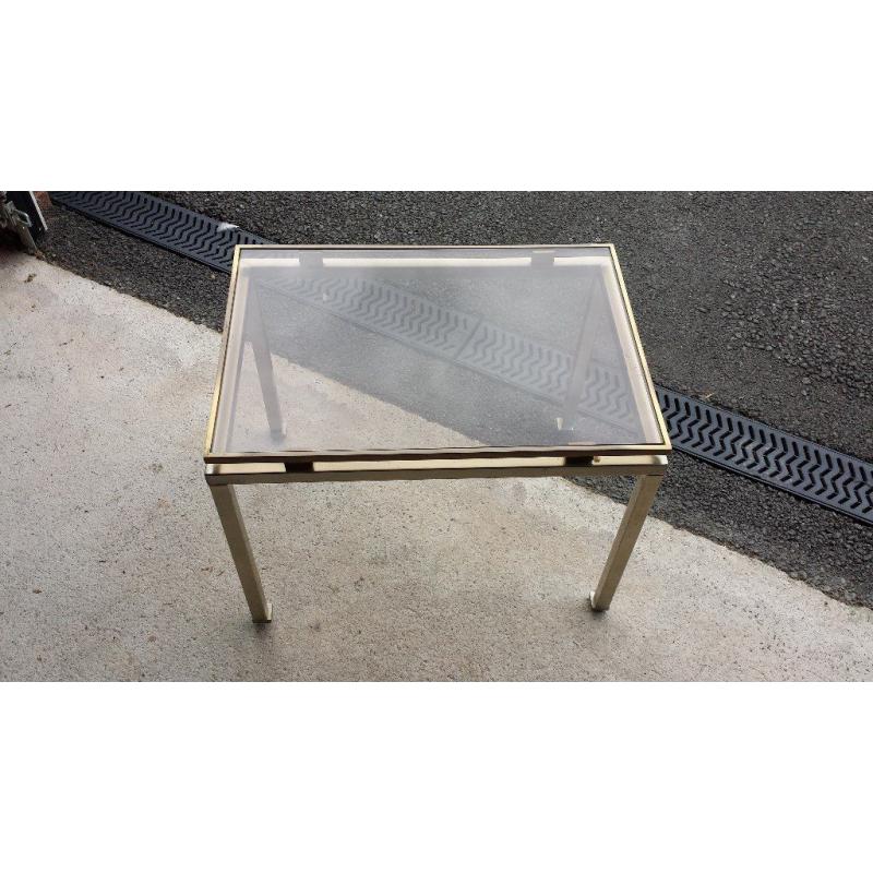 Glass topped coffee table