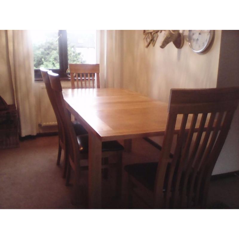 Dining table and 4 chairs