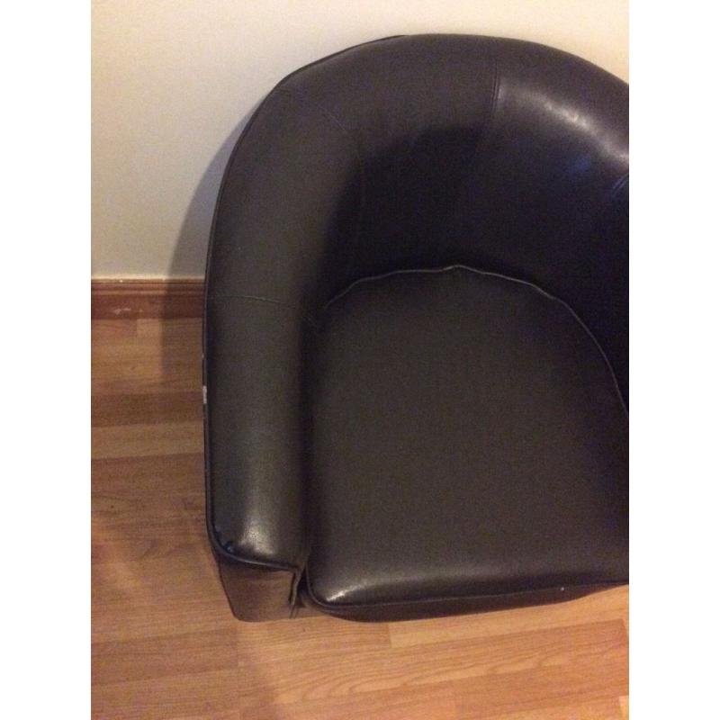 Brown leather tub chair