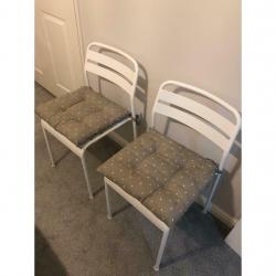 IKEA white metal chairs