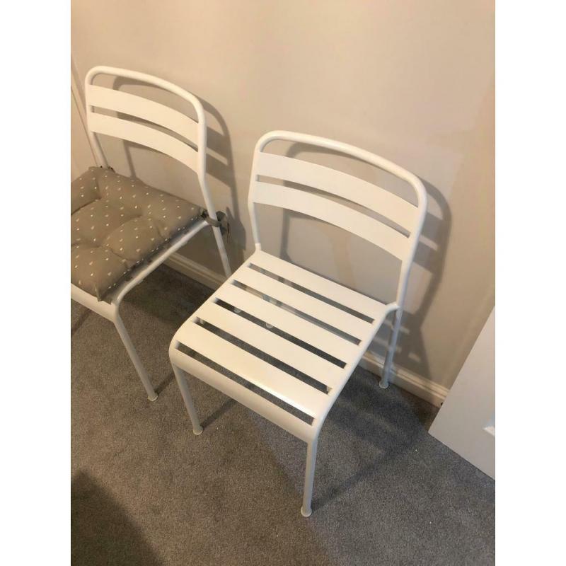 IKEA white metal chairs